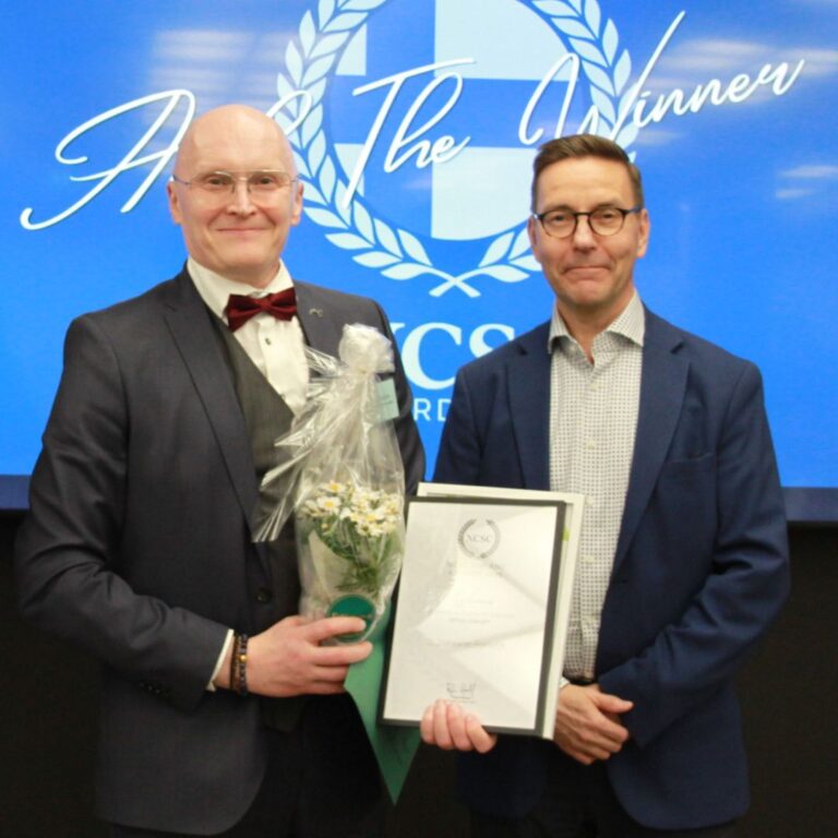 Suomalainen Kirjakauppa accepting Retail Concept of the Year at the NCSC Finland Awards 2026
